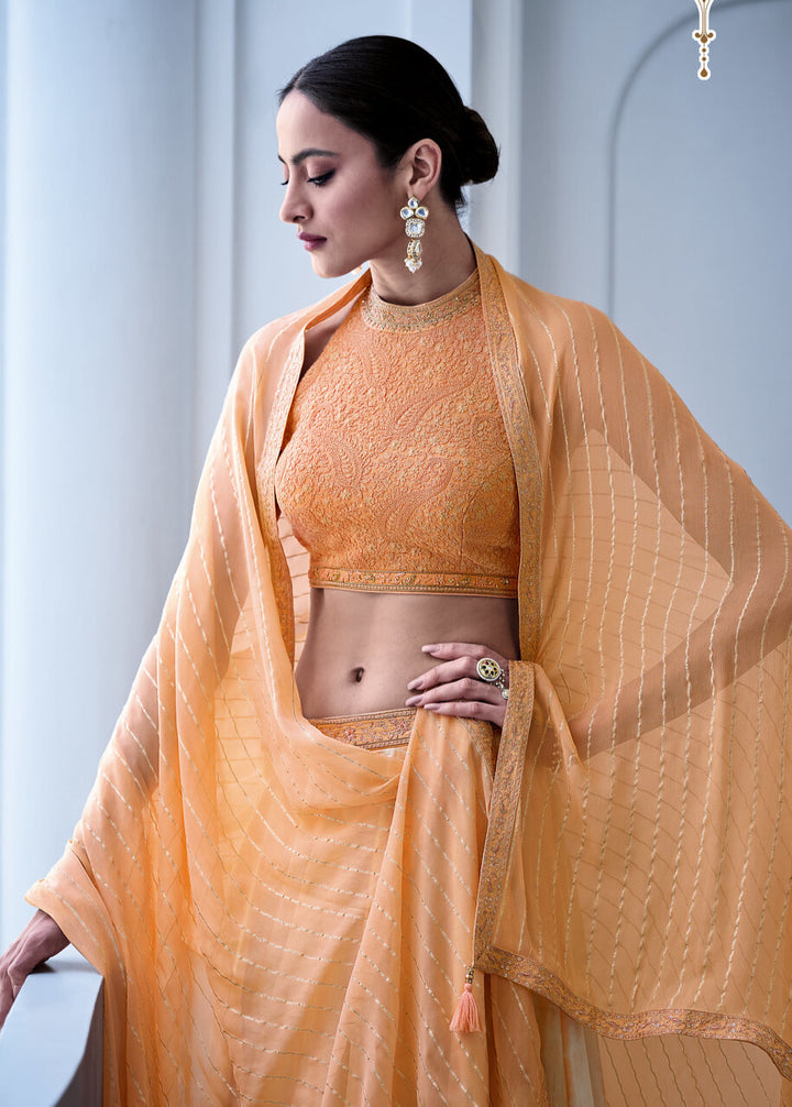 WHITE & ORANGE DIGITALLY PRINTED GAJI SILK LEHENGA WITH CHIKANKARI WORK BLOUSE