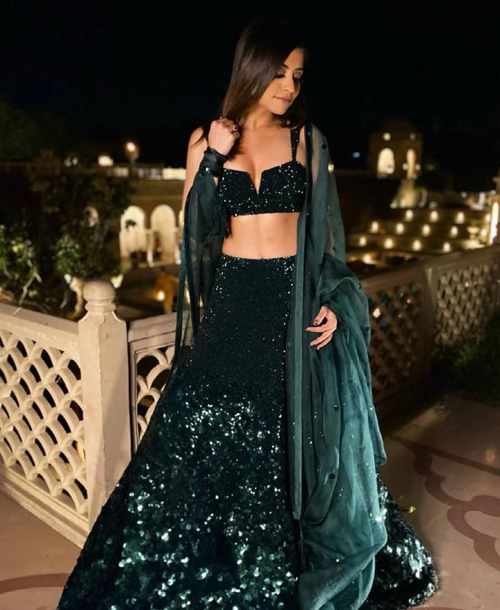 Green georgette lehenga with intricate sequin work, perfect for weddings and special occasions