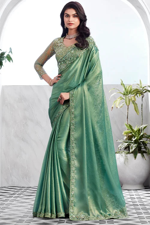 Galm Green Fancy Golden Shimmer Silk Saree With Blouse Piece