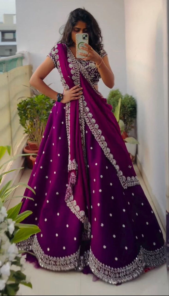 Exquisite purple organza Lehengha with intricate embroidery and cording