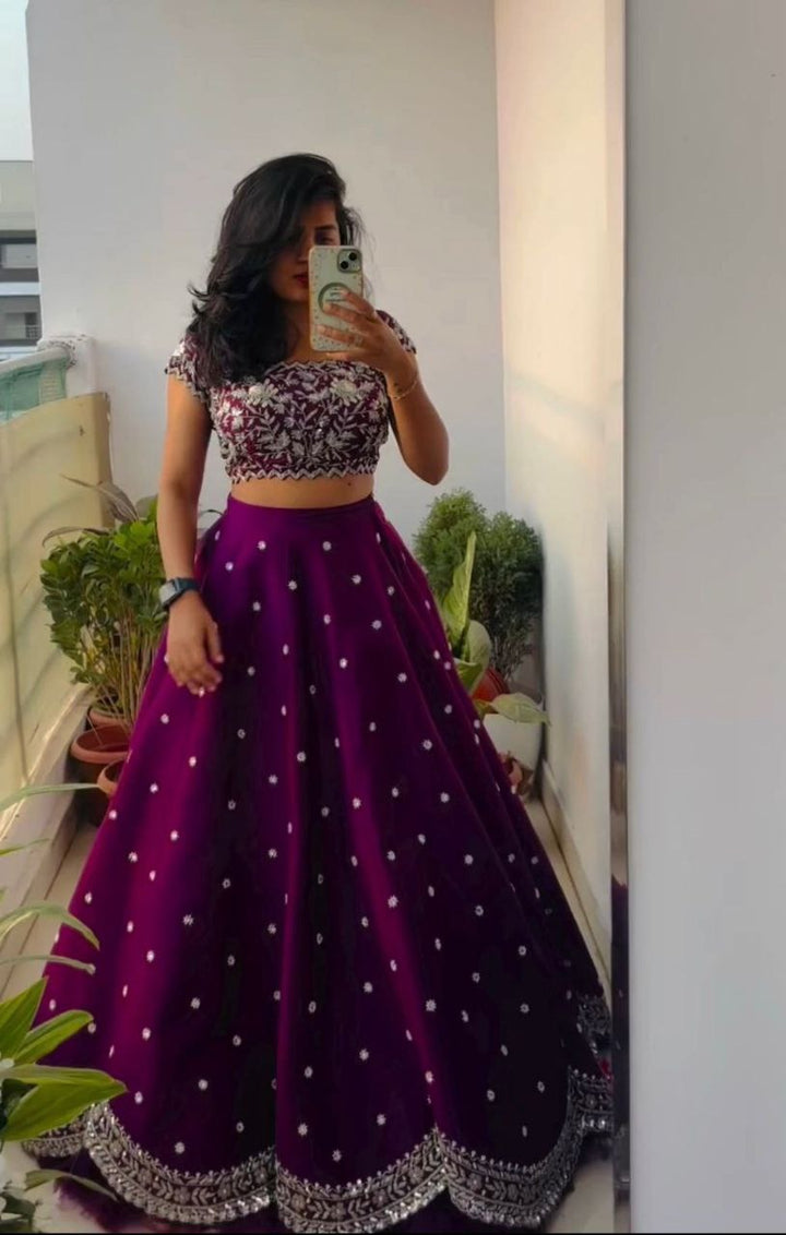 Elegant and stylish purple apple Lehengha with beautiful cording work