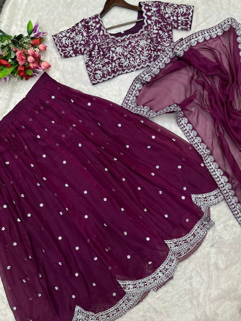 Gorgeous purple apple Lehengha with exquisite embroidery and cording work