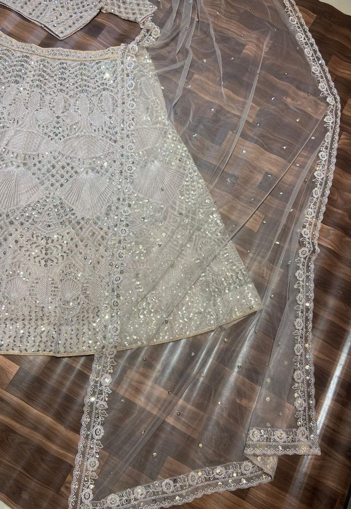 Glamorous Net Lehenga with Lavish Sequins and Crystal Detailing