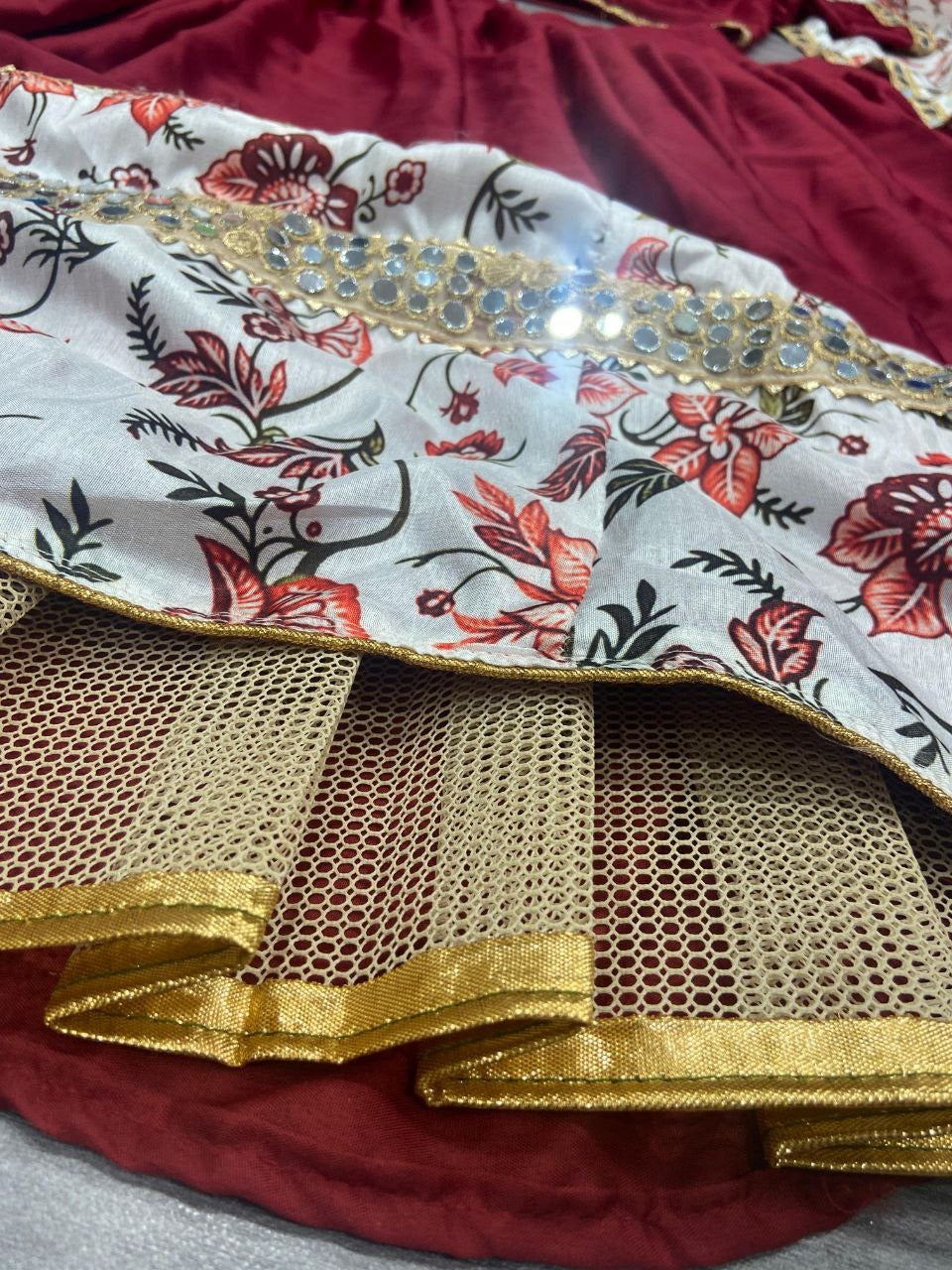 Exquisite maroon color premium malai satin silk featuring intricate digital print design and heavy mirror embellishments