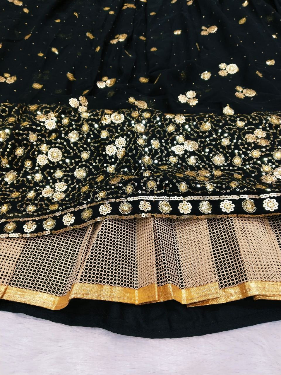 Premium georgette black lehenga adorned with intricate and beautiful embroidery