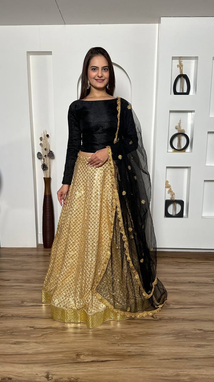 Golden Color Kasturi silk lehenga with heavy sequins work & foil border work