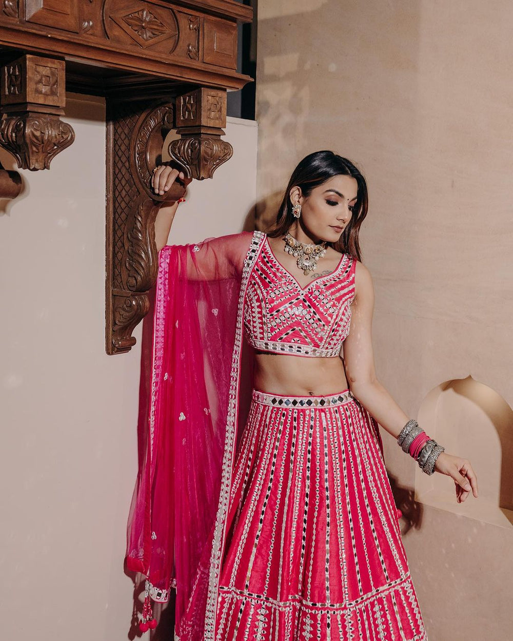 Beautiful pink heavy slub silk lehenga adorned with intricate thread and paper mirror work