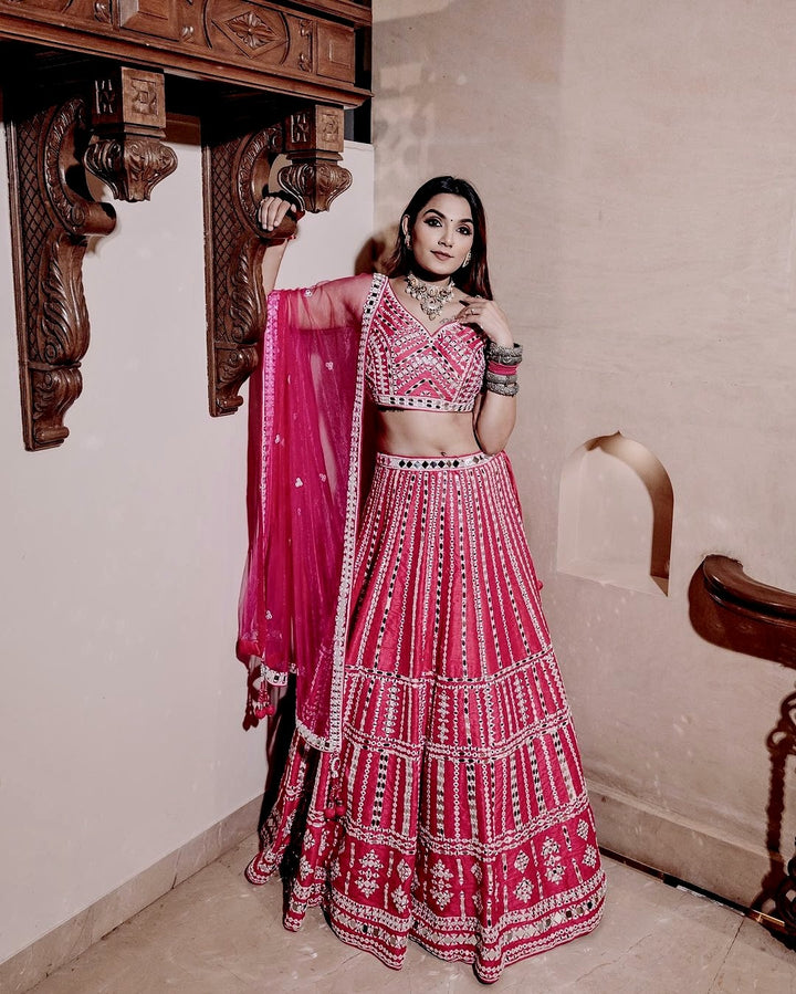 Beautiful pink heavy slub silk lehenga with intricate thread and paper mirror work