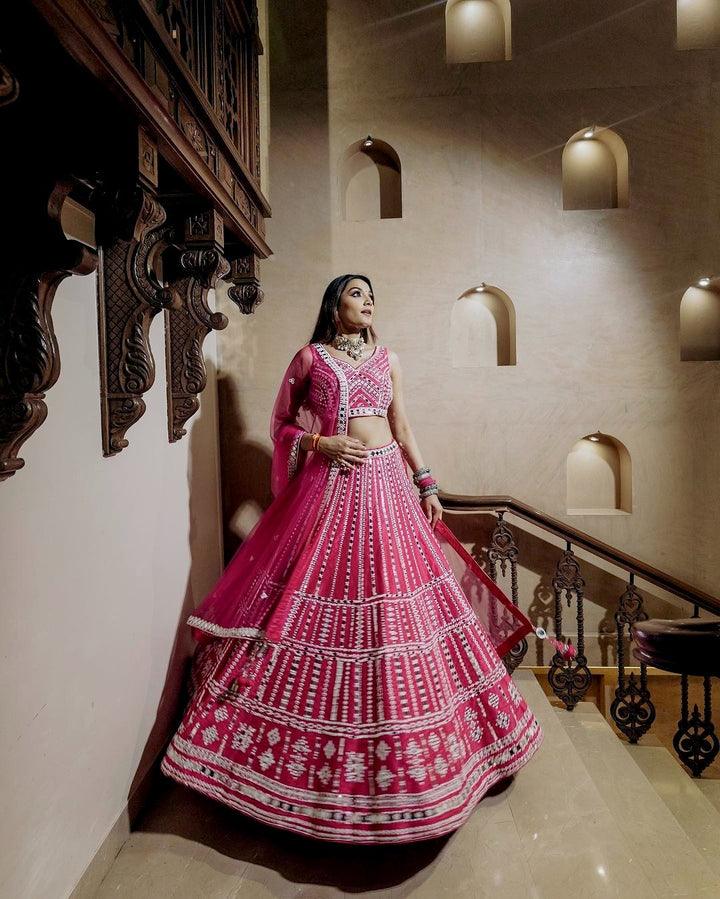 Beautiful pink color heavy slub silk lehenga with intricate thread and paper mirror work embellishments