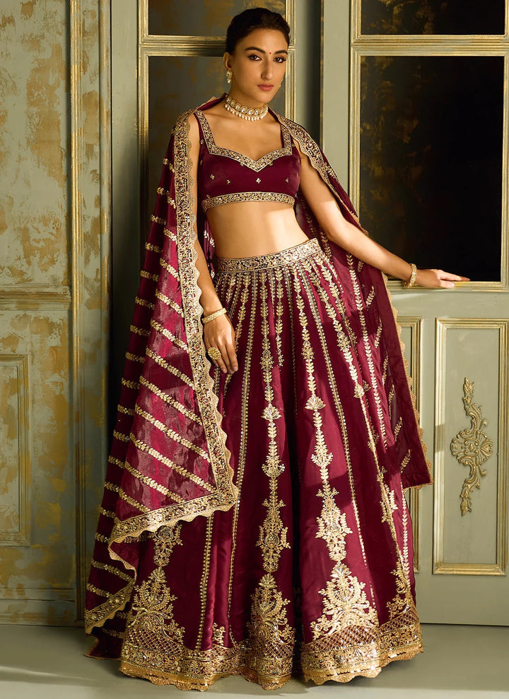 Wine Kasturi silk lehenga with sequins , dori & zari work