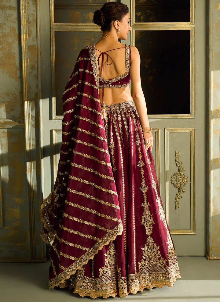 Wine Kasturi silk lehenga with sequins , dori & zari work