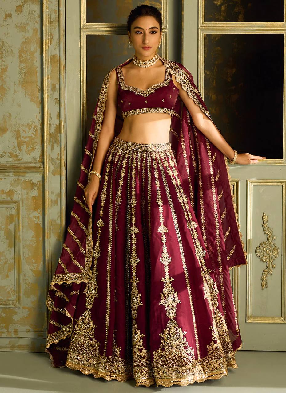 Wine Kasturi silk lehenga with sequins , dori & zari work