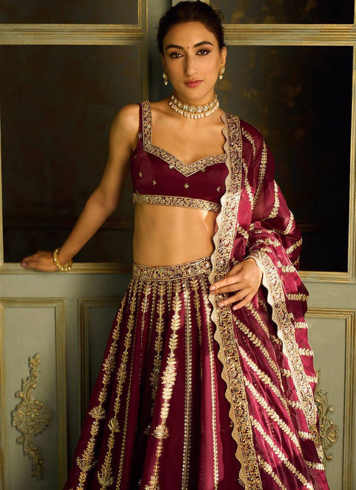 Wine Kasturi silk lehenga with sequins , dori & zari work