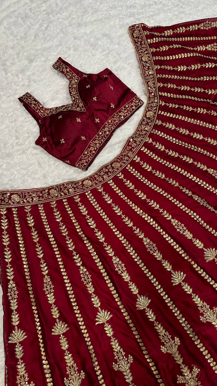 Wine Kasturi silk lehenga with sequins , dori & zari work