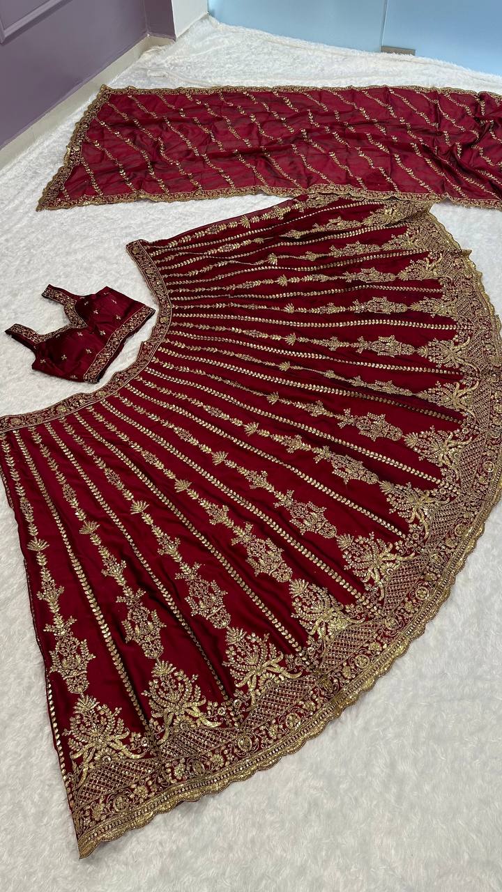 Wine Kasturi silk lehenga with sequins , dori & zari work