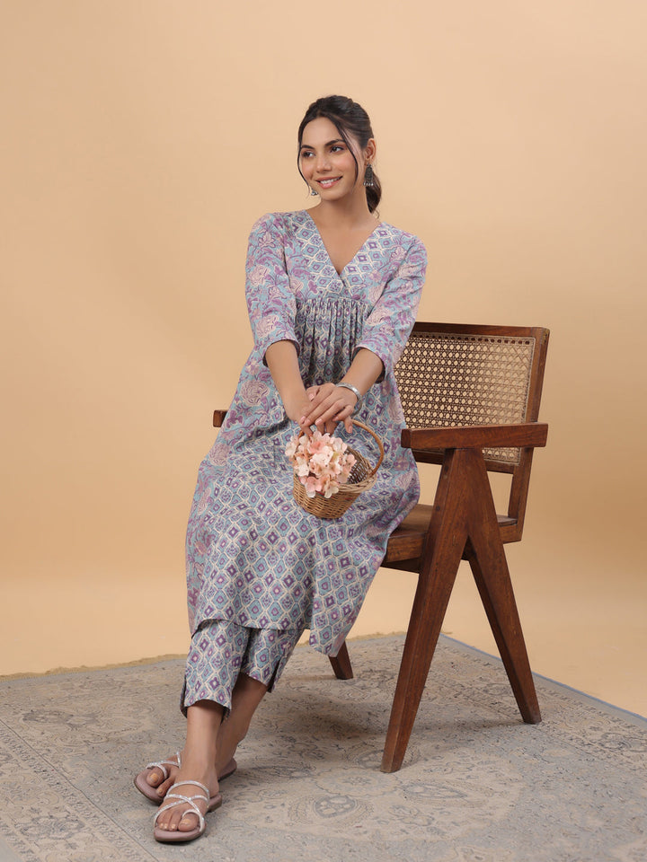 Light Blue Cotton Floral Panelled A-Line Kurta Set  - By Janasya