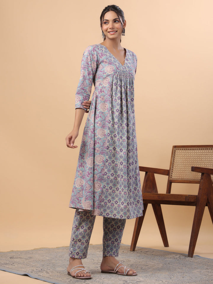 Light Blue Cotton Floral Panelled A-Line Kurta Set  - By Janasya