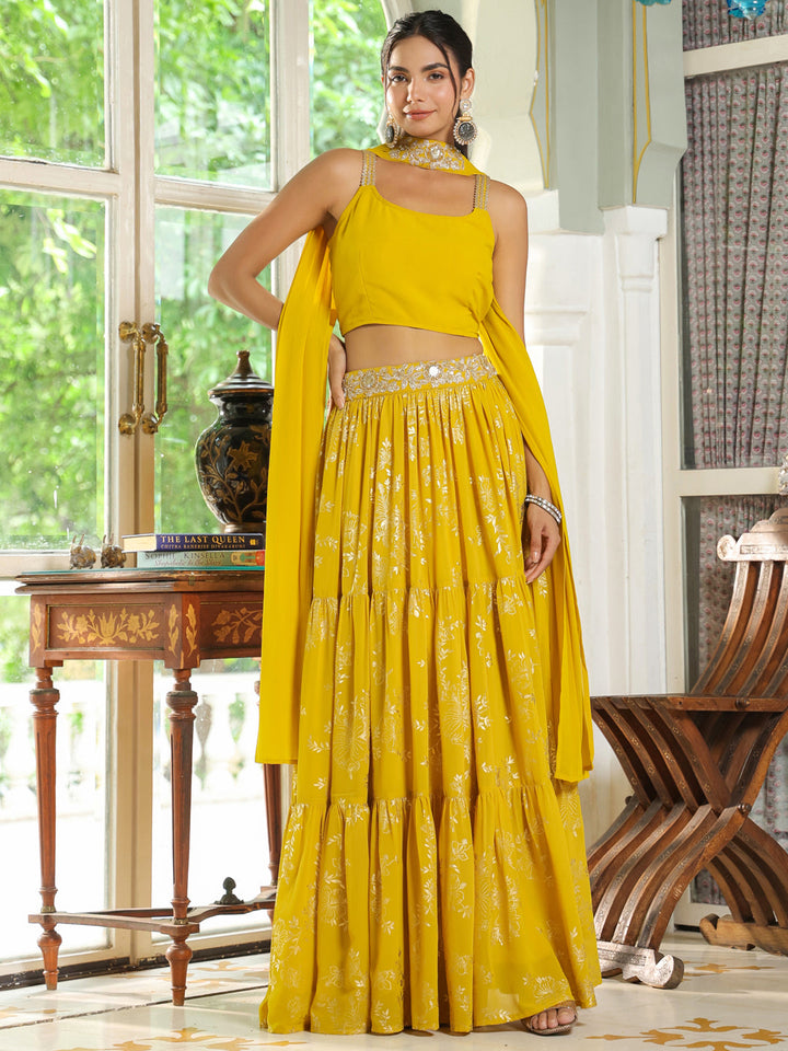 Yellow Georgette Embellished Foil Printed Tiered Lehenga Choli Set  - By Janasya