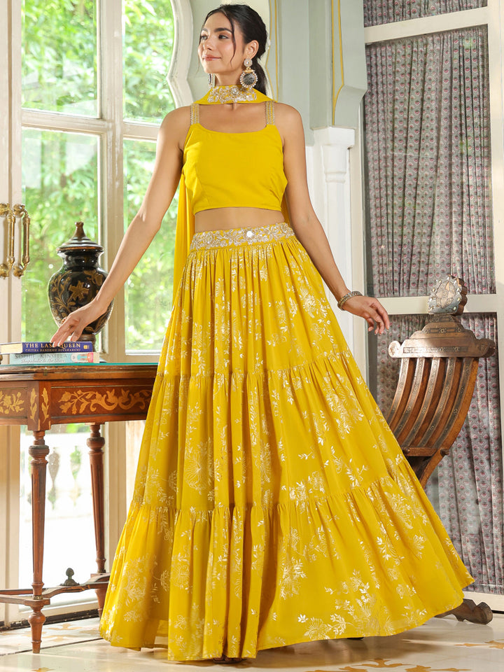 Yellow Georgette Embellished Foil Printed Tiered Lehenga Choli Set  - By Janasya