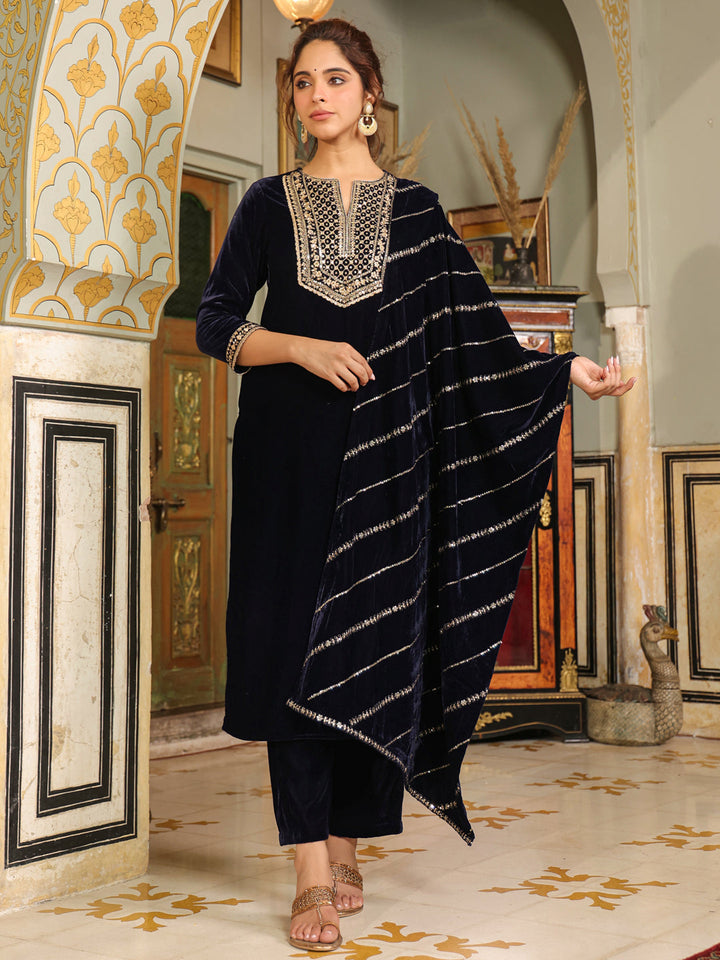 Model wearing the Janasya Navy Blue Velvet Zari Embroidered Straight Kurta