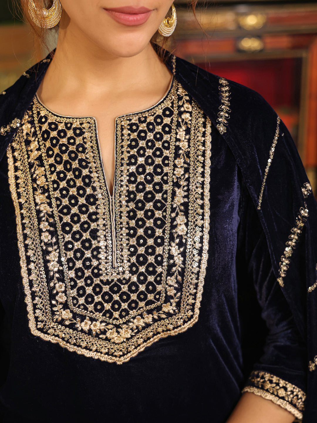 Elegant and traditional straight kurta set in rich velvet fabric