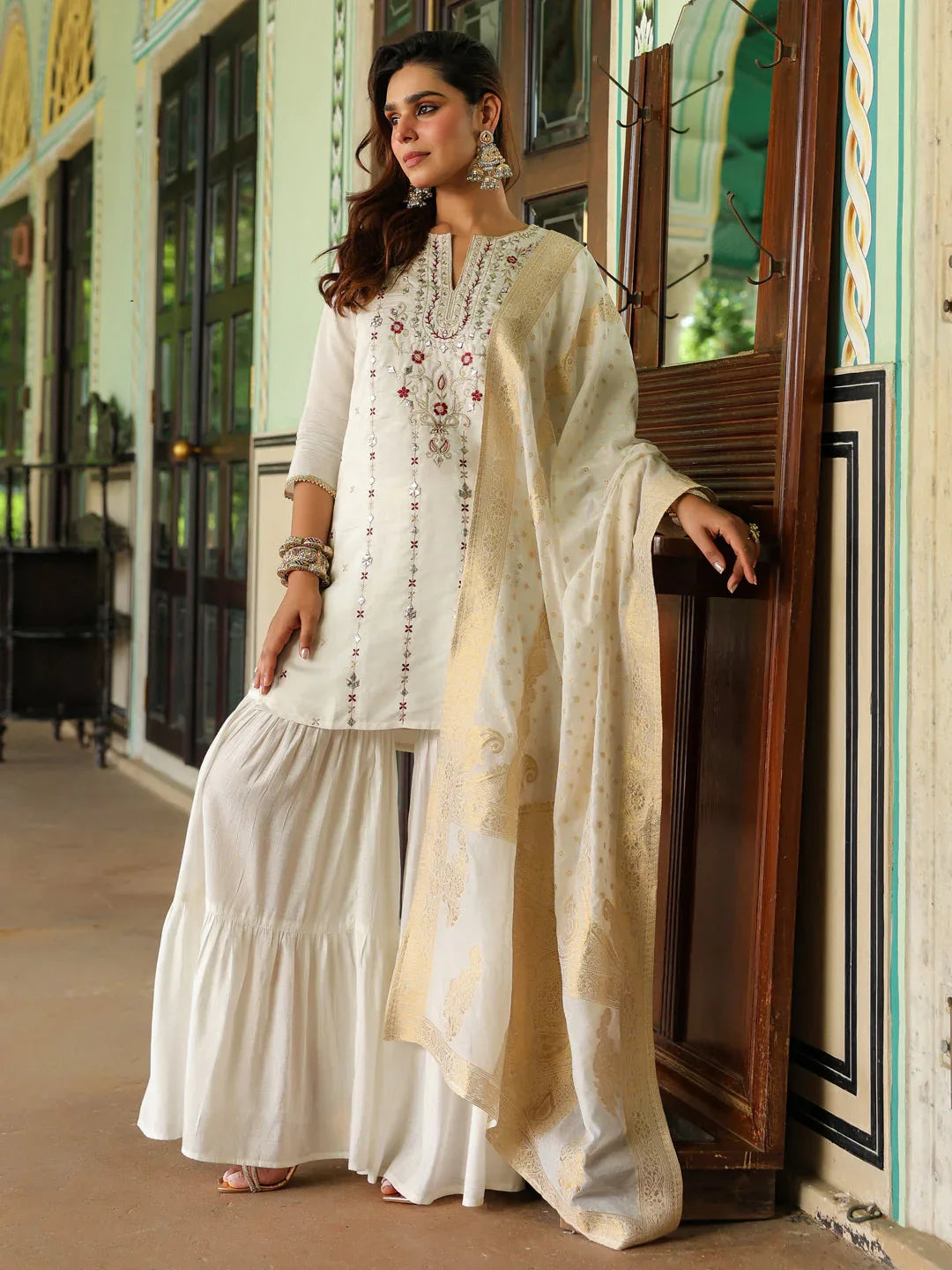 Janasya Women's Off White Chanderi Silk Embroidered Mirror Work Kurta With Sharara & Dupatta Set
