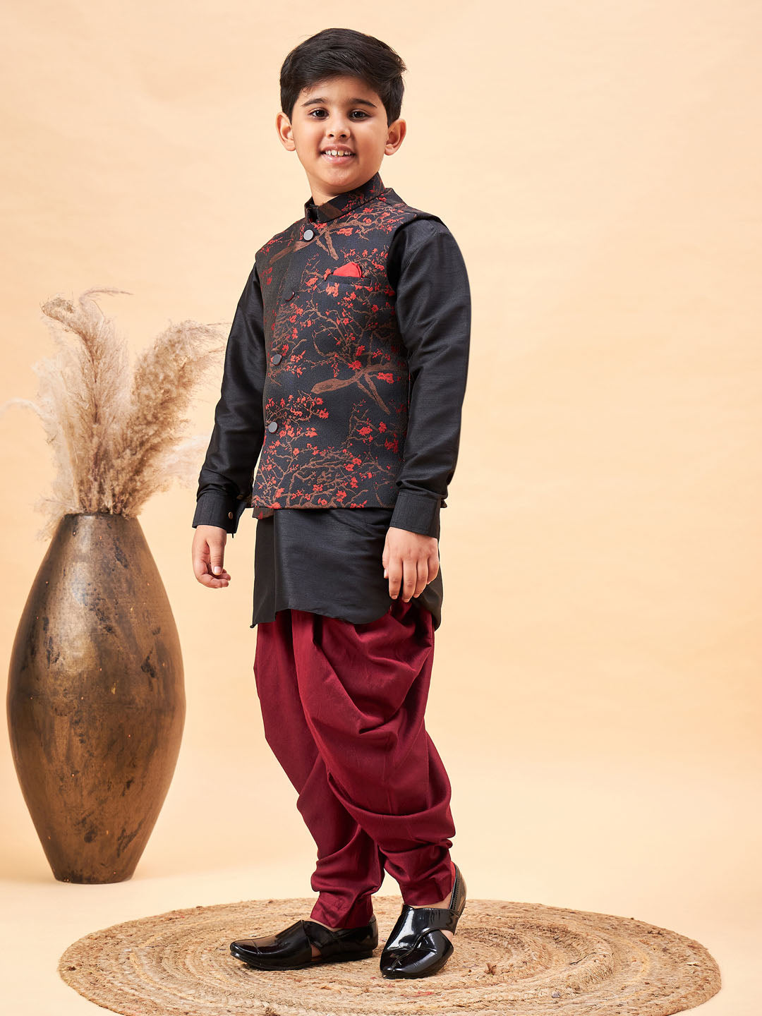 Vastramay Boys Maroon Jacquard Jacket With Black kurta and Dhoti Set