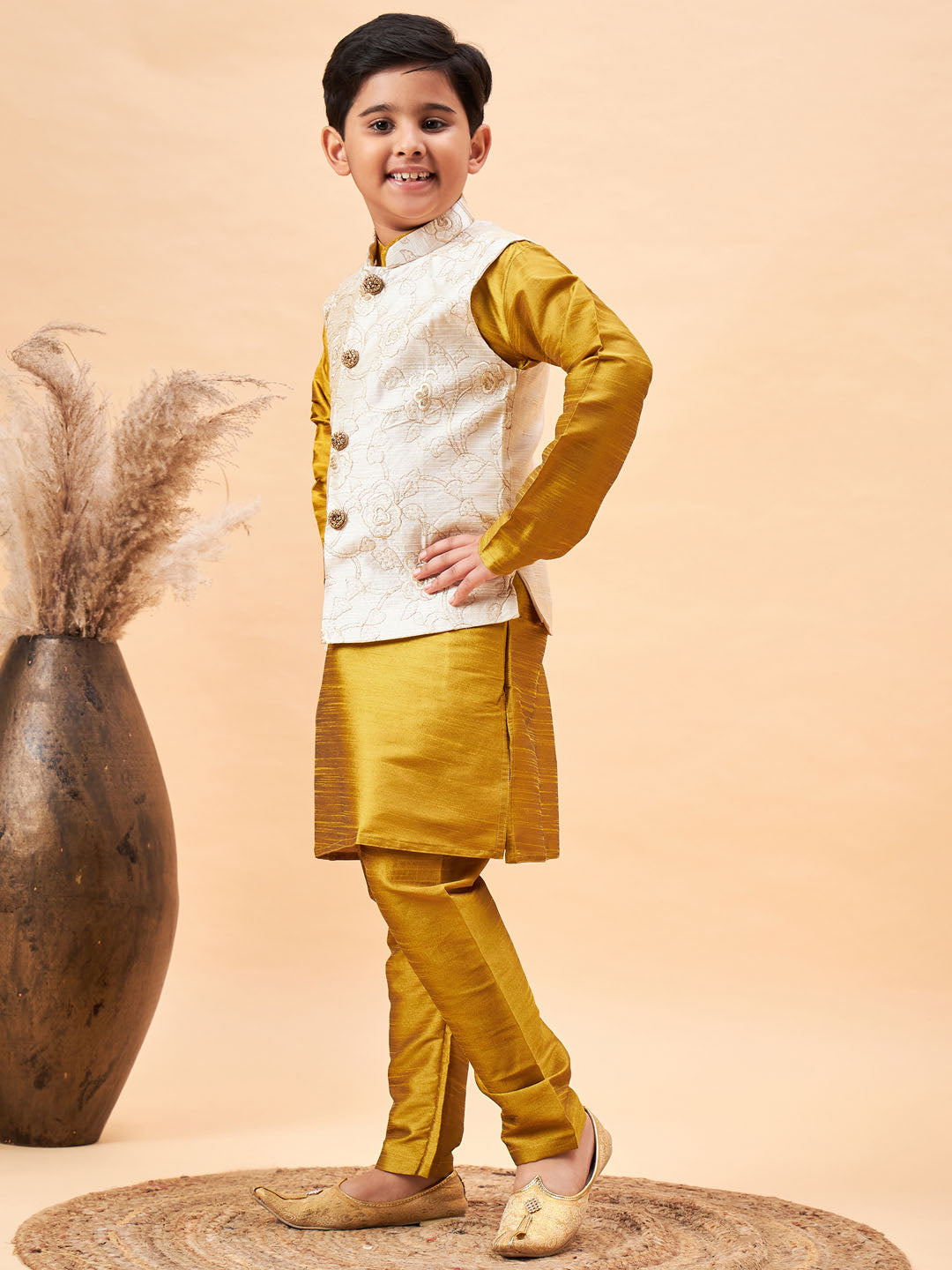 Vastramay Boy's Beige Nehru Jacket With Mustard Kurta And Pyjama Set