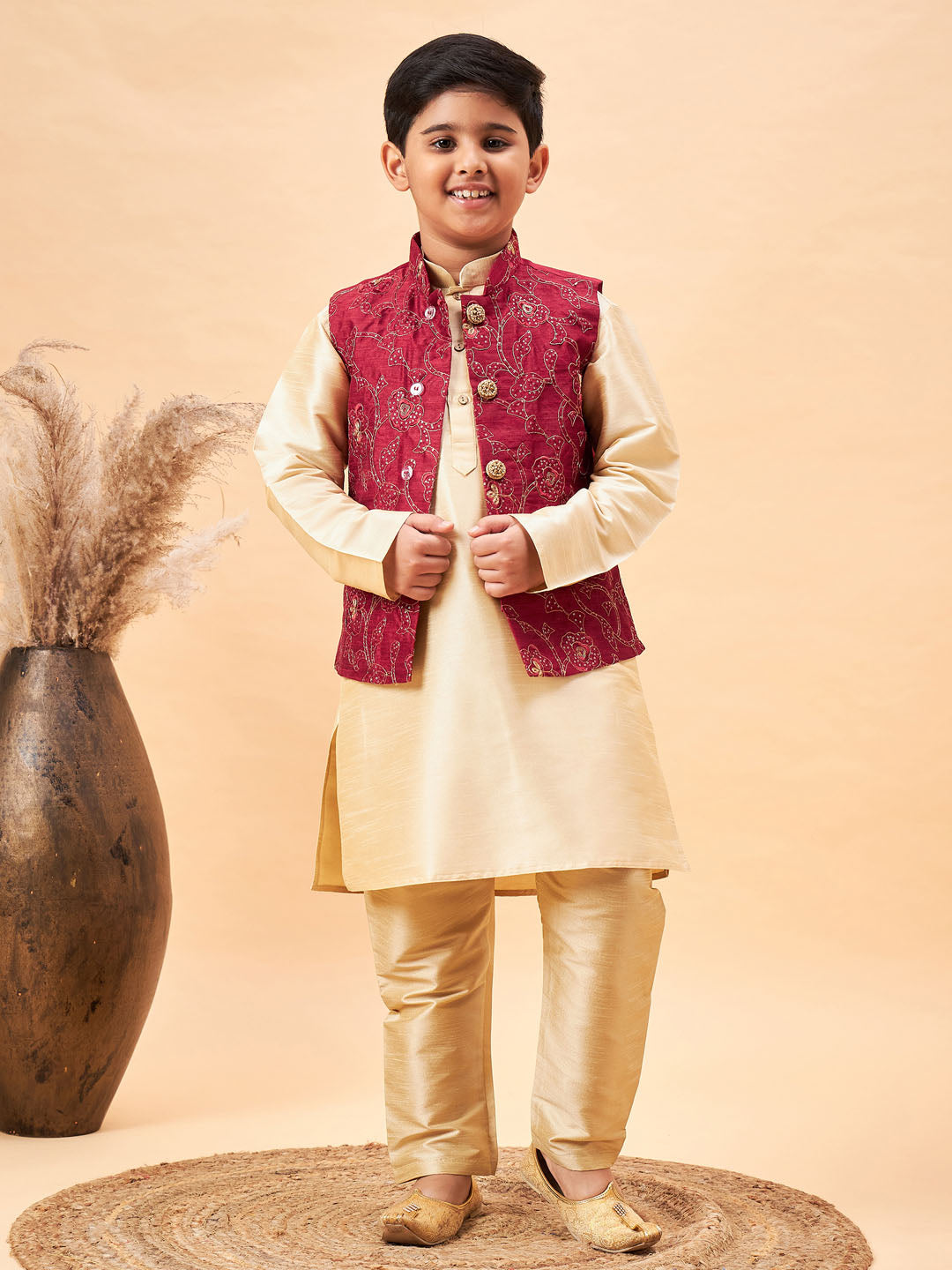 VASTRAMAY Boy's Maroon Nehru Jacket With Gold Kurta And Pyjama Set