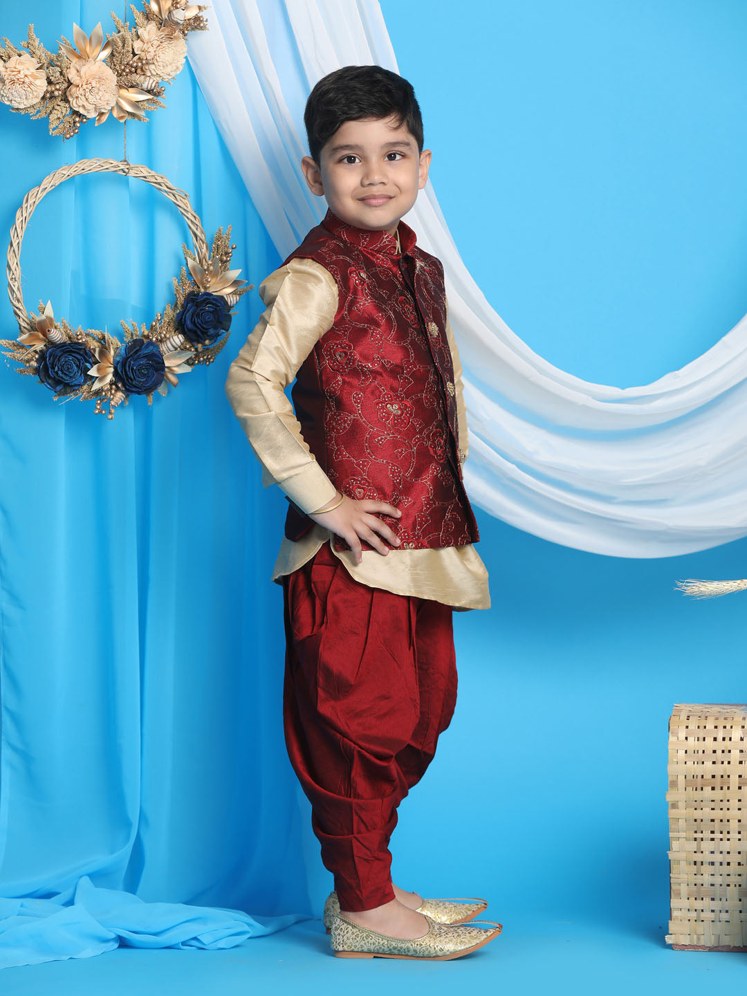 Vastramay Boy's Maroon Embroidered Nehru Jacket With Gold Kurta And Maroon Dhoti Set