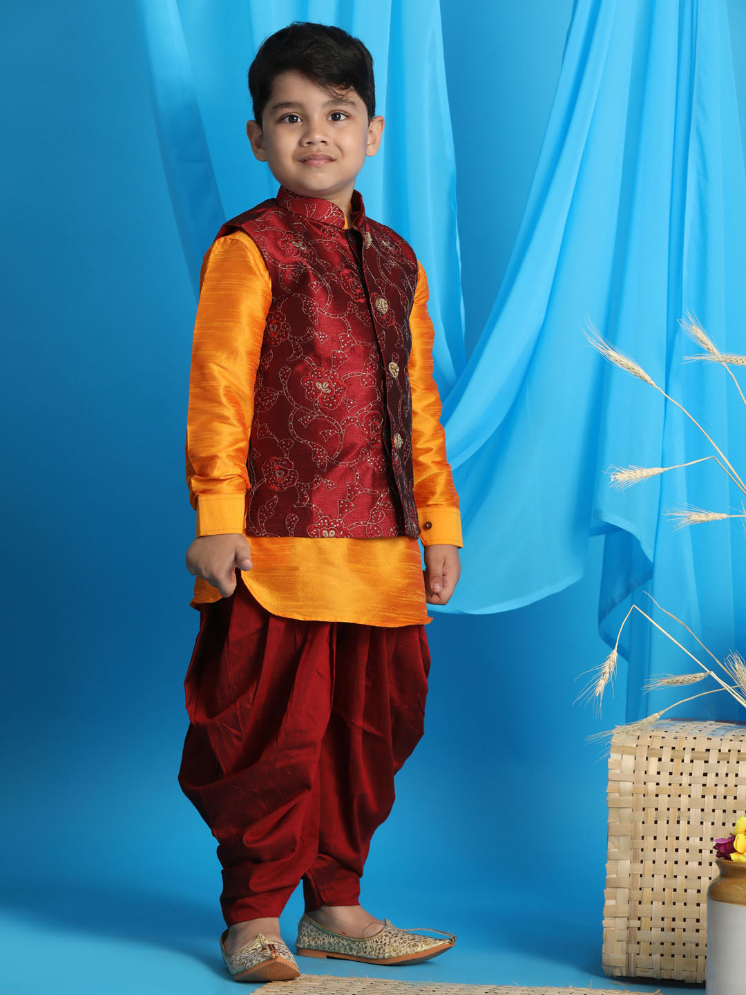 Vastramay Boy's Maroon Embroidered Nehru Jacket With Orange Kurta And Maroon Dhoti Set - qivii