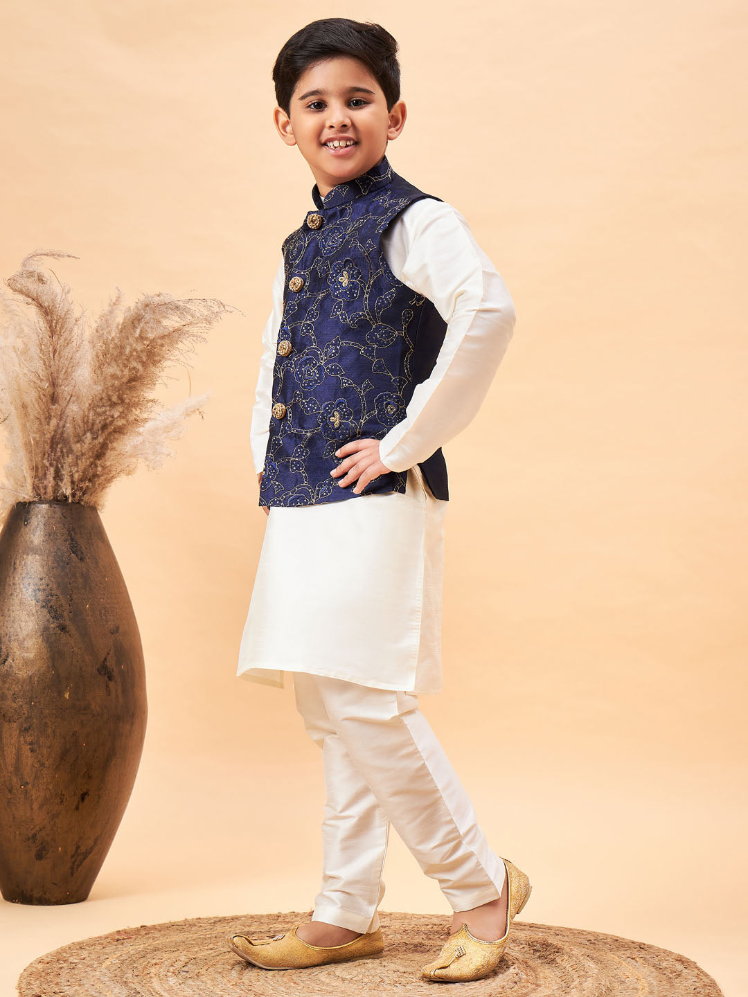 Vastramay Boy's Navy Blue Nehru Jacket With Cream Kurta And Pyjama Set