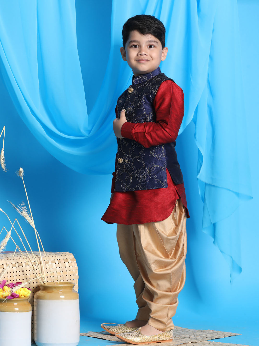 Vastramay Boy's Navy Blue Embroidered Nehru Jacket With Maroon Kurta And Rose Gold Dhoti Set