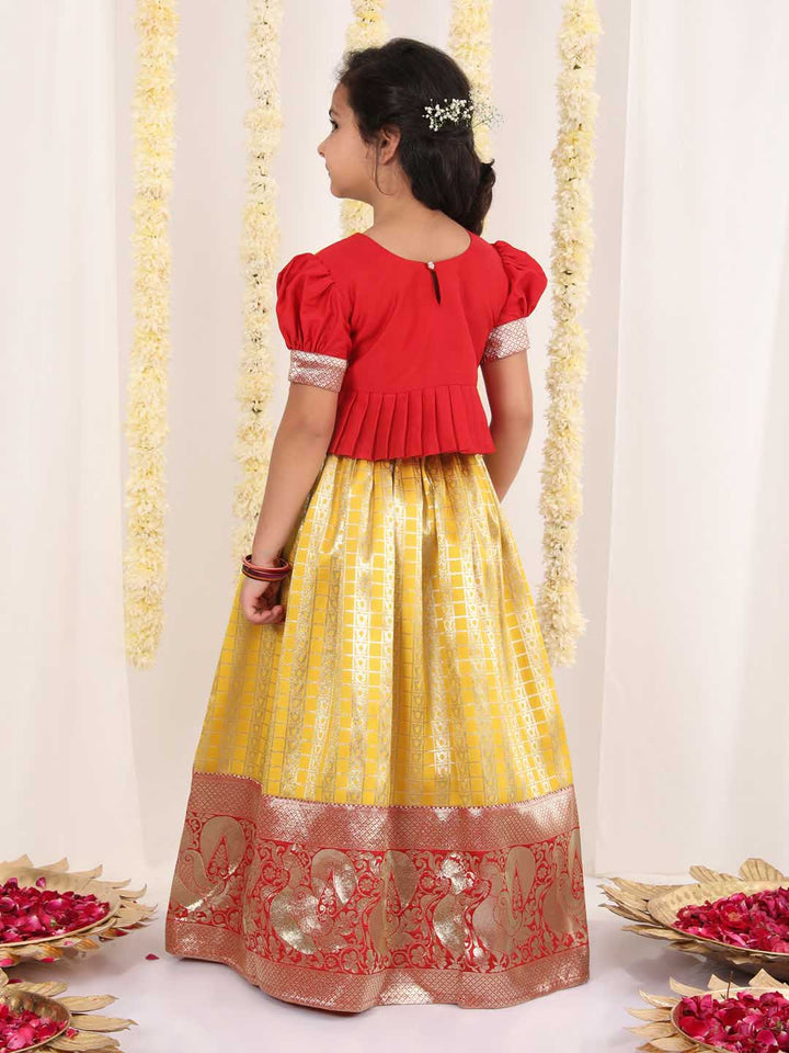 Vastramay Girl's Yellow Pavda Pattu Lehenga Choli Set