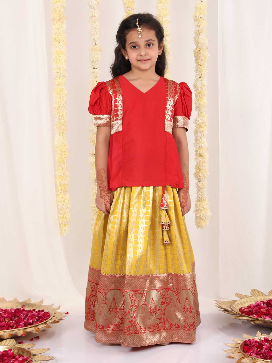 Vastramay Girl's Yellow And Maroon Pavda Pattu Lehenga Choli Set