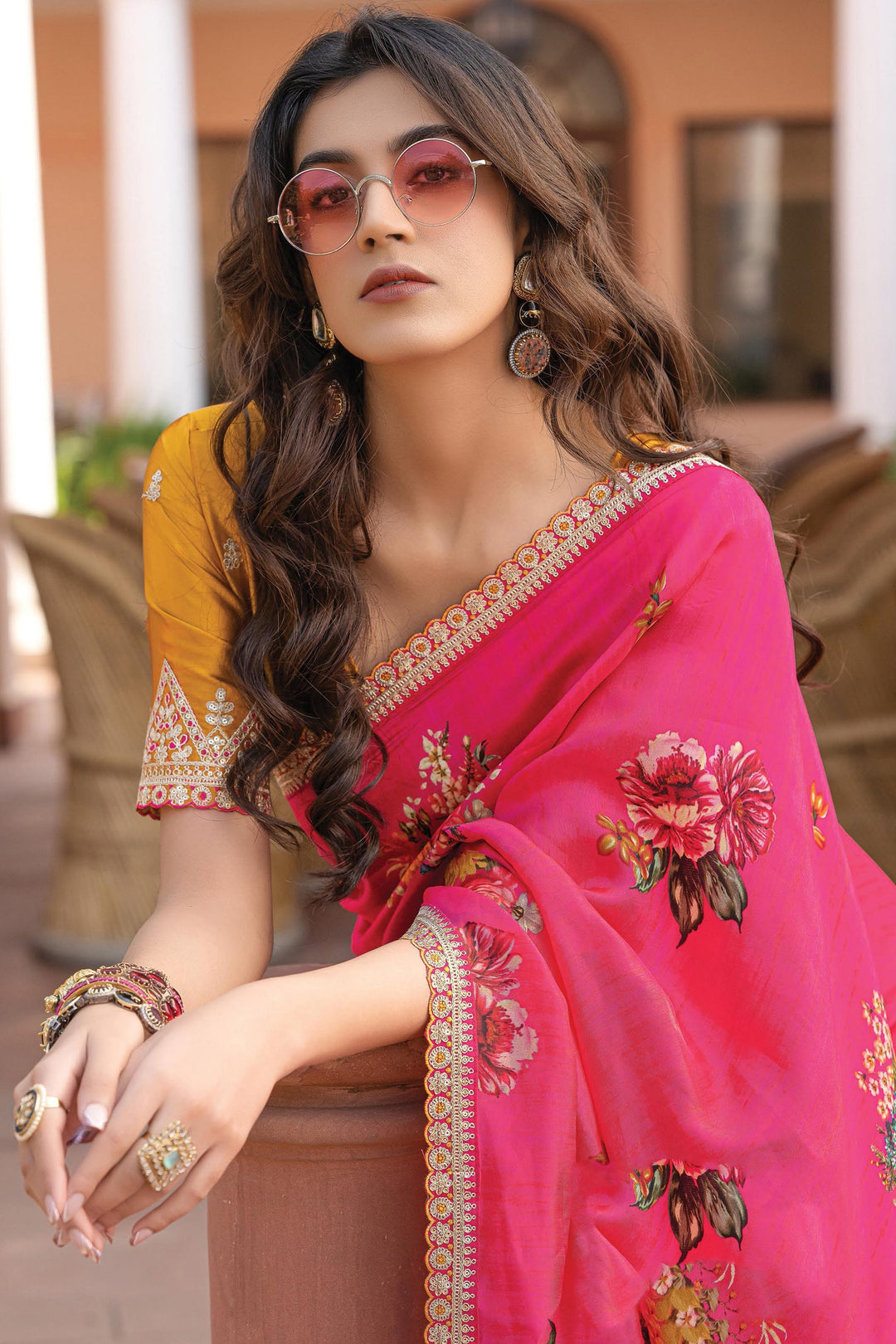 Elegant and alluring Rani color saree with intricate printed design