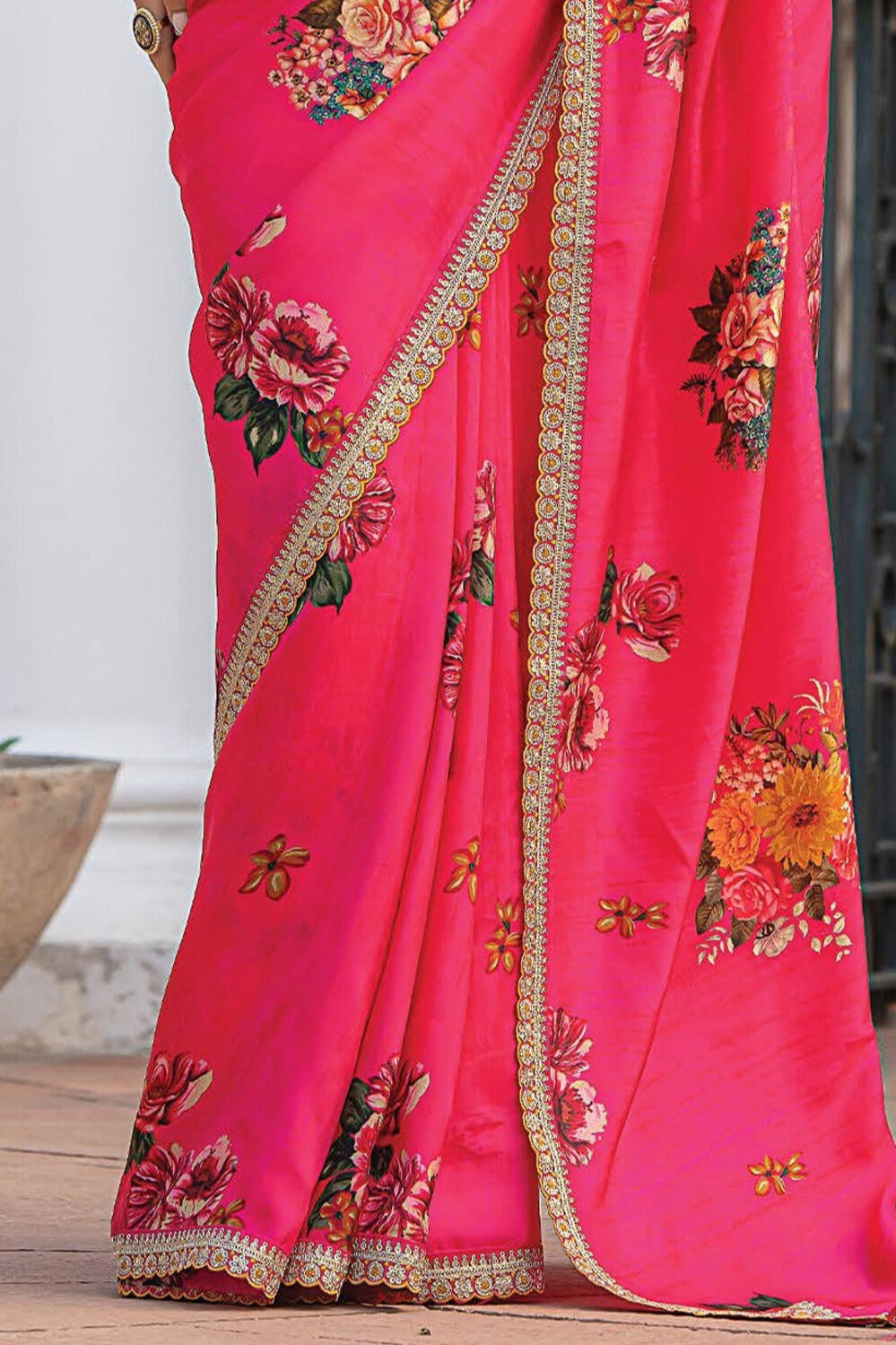 Beautifully crafted Rani color saree with eye-catching printed work