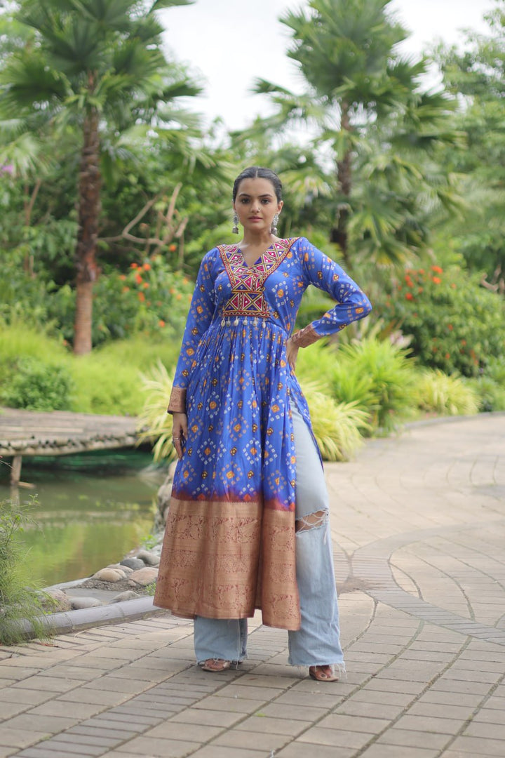 Blue Color Printed Cotton With Kutchi Gamthi Work and Kodi Lace, a traditional and vibrant textile showcasing intricate embroidery and handcrafted details