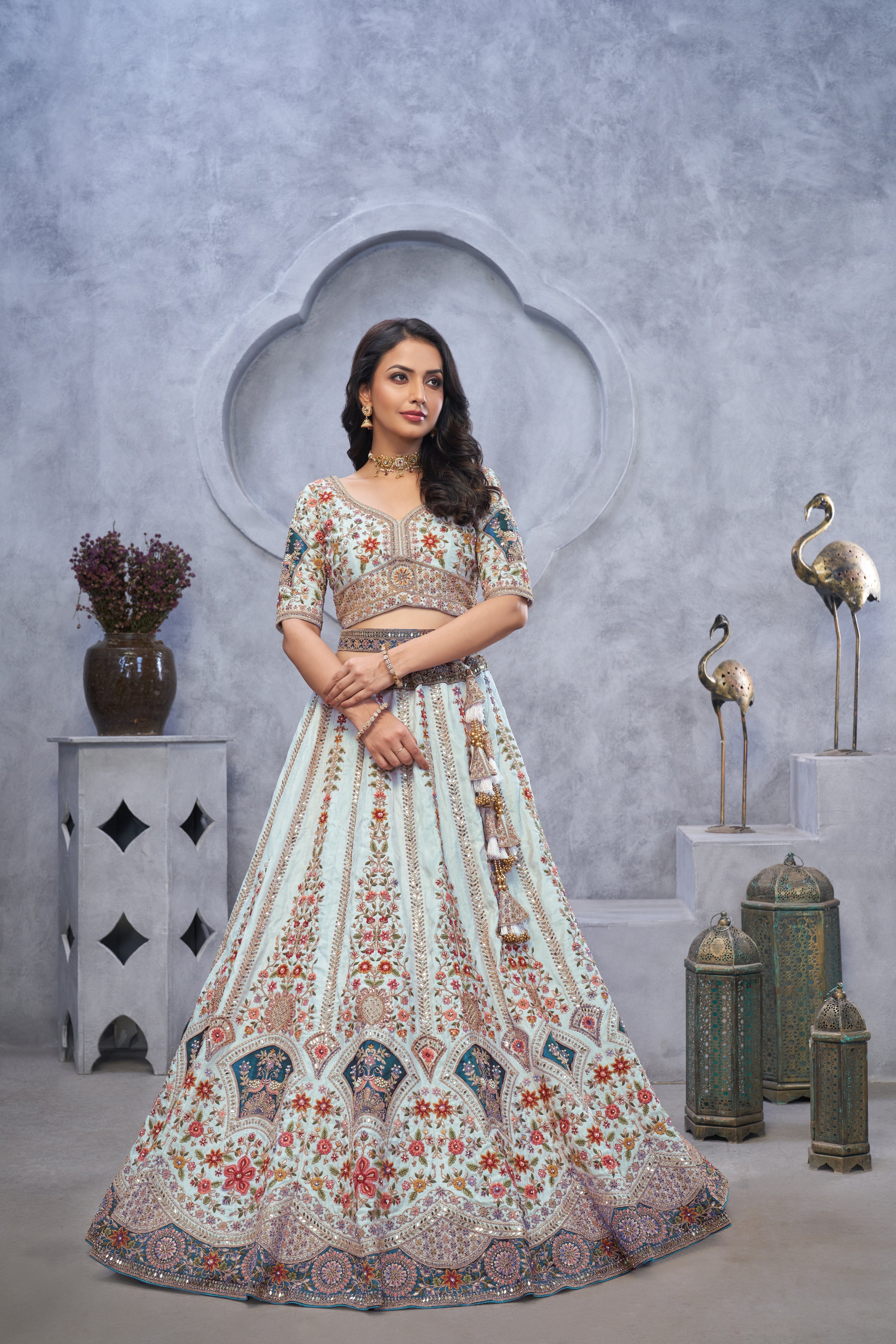 Stunning Sky Blue Lehenga with Zari Paisley Embroidery, Silk Patches, and Peacock Motifs - qivii