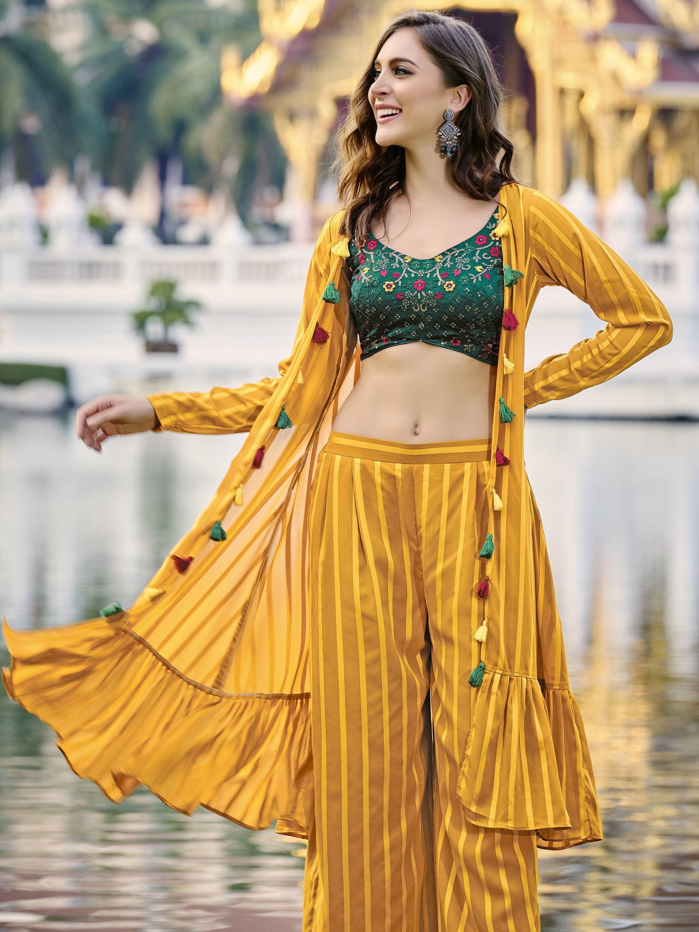 Attractive Yellow Embroidered Georgette Palazzo Suit With Jacket - Front View Showing Intricate Embroidery And Flared Palazzo Pants