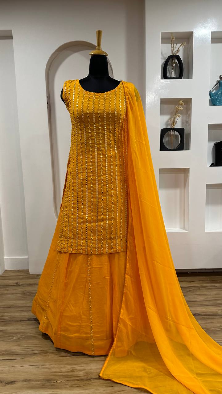  Stylish yellow georgette lehenga with heavy pagdi work and paper mirror work