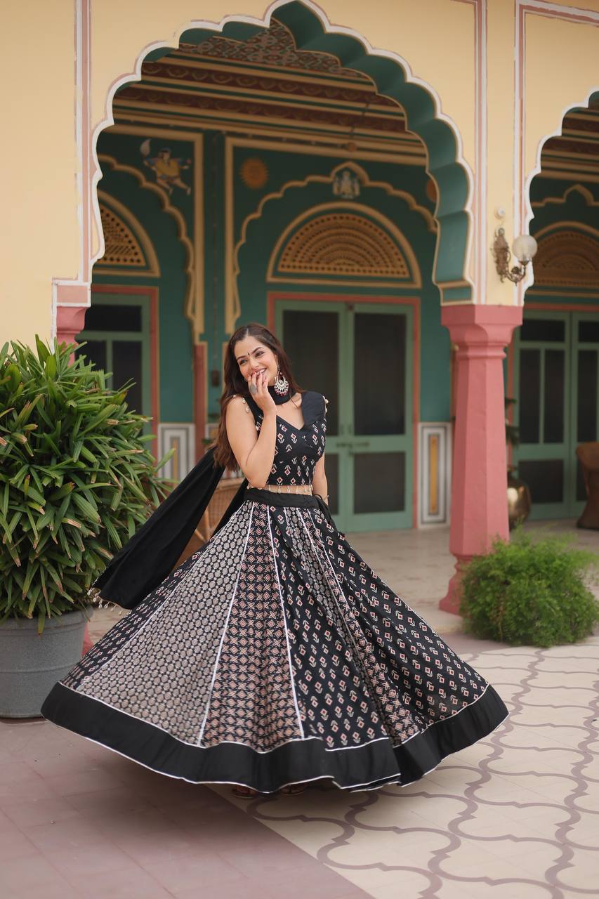 Black Printed Reyon With Gota Patti Lace And Printed Kali Pattern.