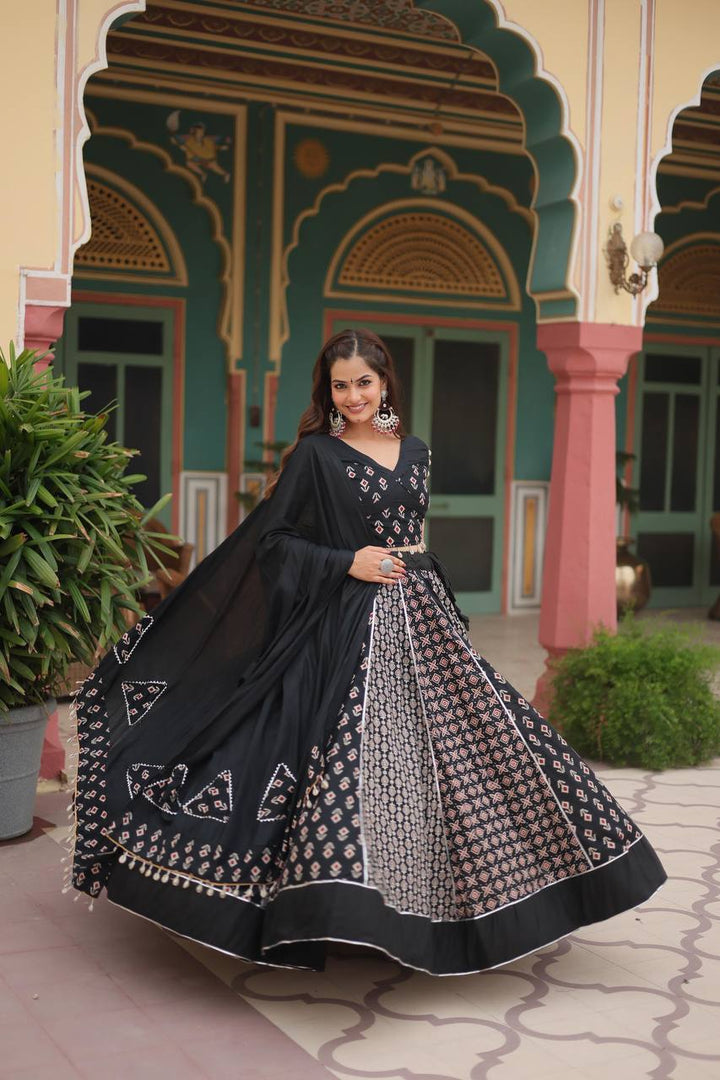 Black Printed Reyon With Gota Patti Lace And Printed Kali Pattern.