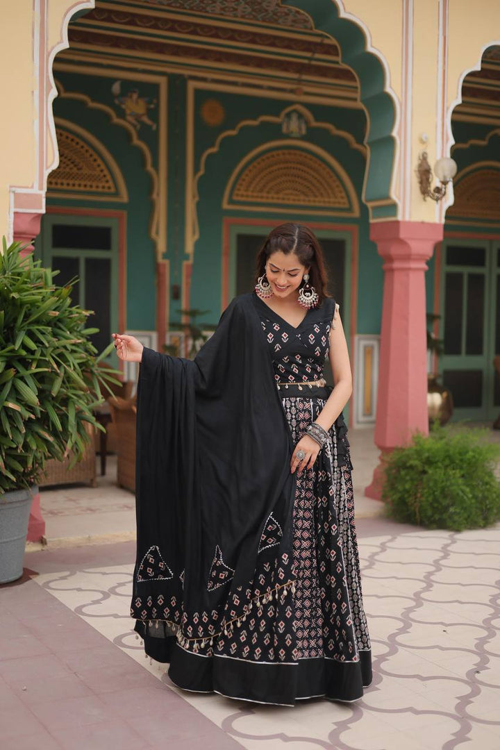 Black Printed Reyon With Gota Patti Lace And Printed Kali Pattern.