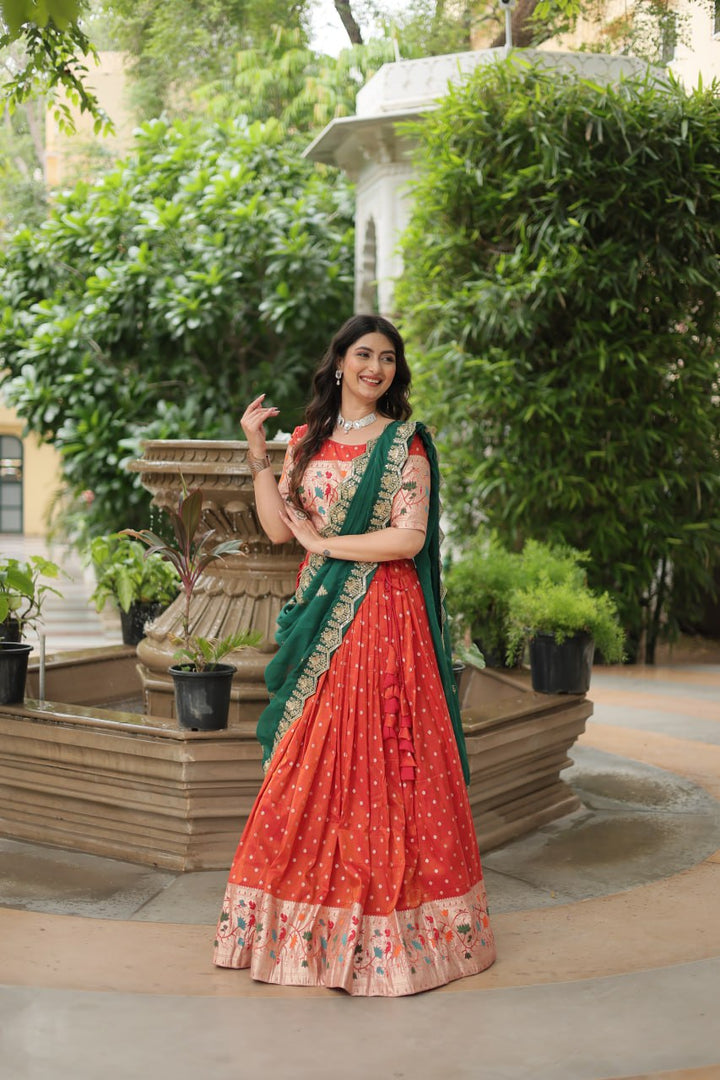 Orange Cosmos Jequard With Meena Weaving Lehenga