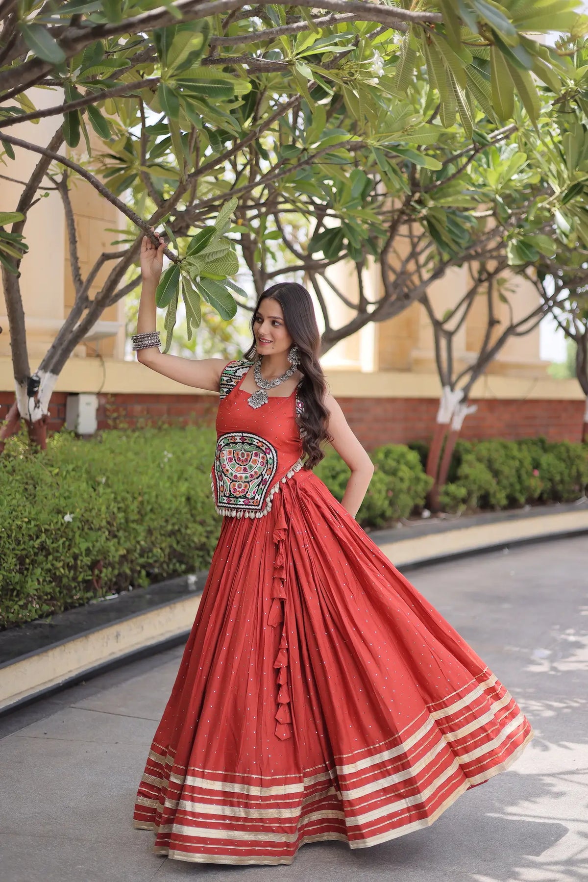 5 Meter Flair | Rust Orange Garba Chaniya Choli With Gamthi & Mirror Work