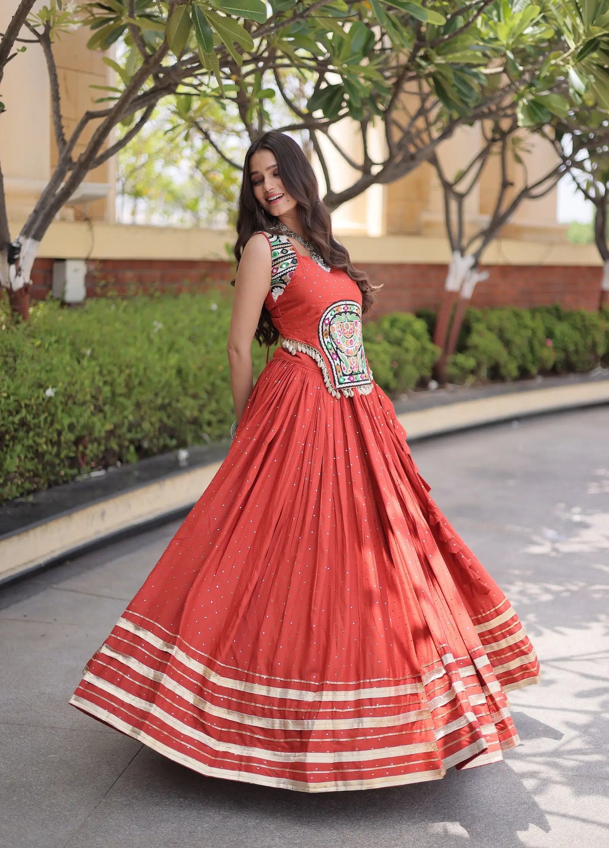 5 Meter Flair | Rust Orange Garba Chaniya Choli With Gamthi & Mirror Work