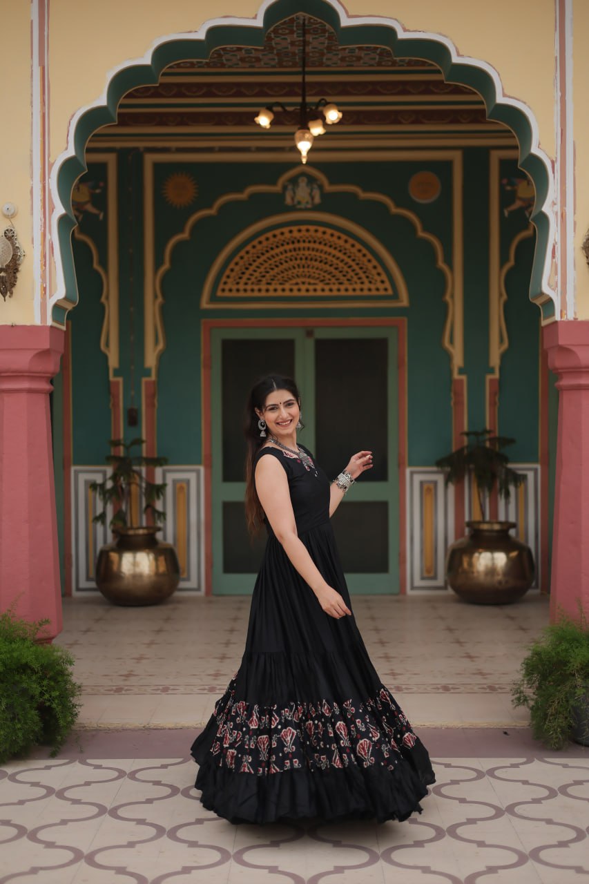 Black Reyon Fabric with Printed Rayon Fabric Atttached In Frill And Neck Gown