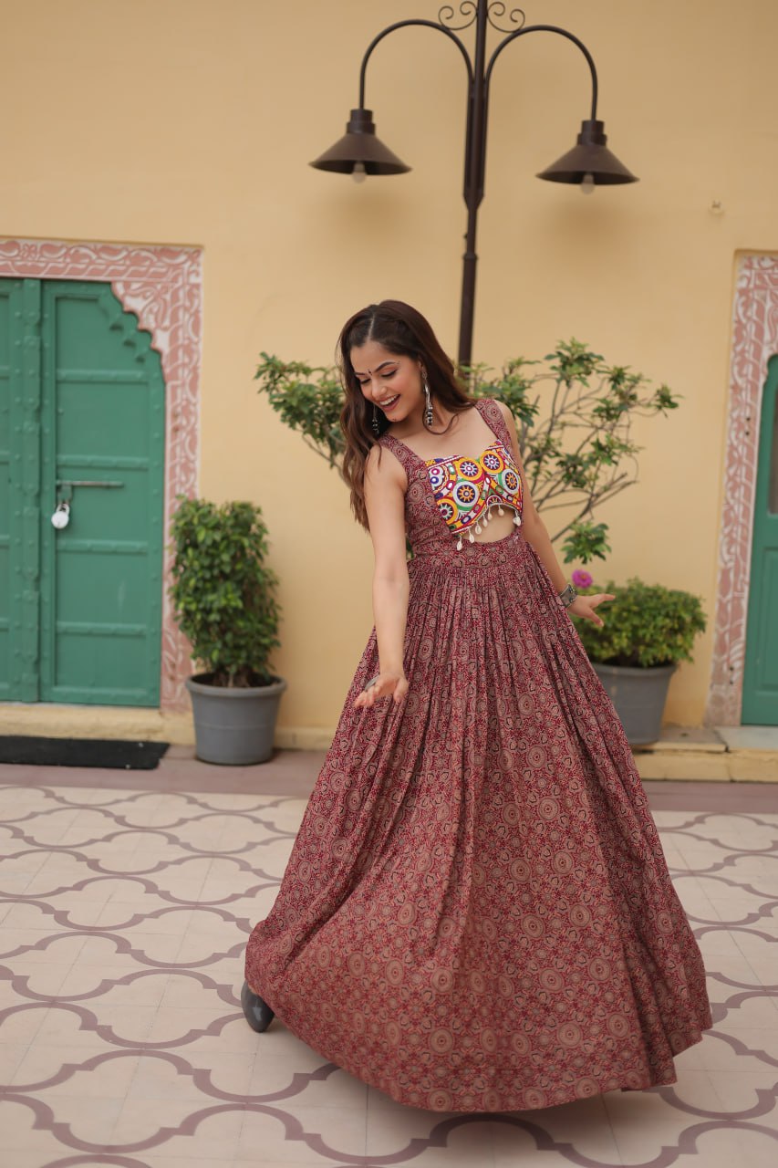 Maroon Color Printed Cotton With Kutchi Gamthi Work and Kodi Lace.