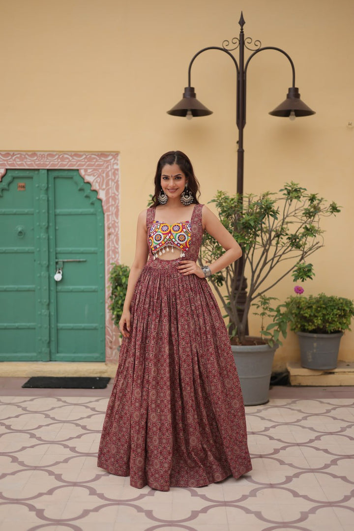 Maroon Color Printed Cotton With Kutchi Gamthi Work and Kodi Lace.